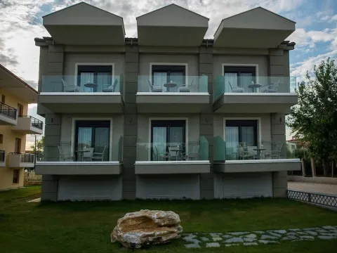 Grey House Apartments - Photo 1