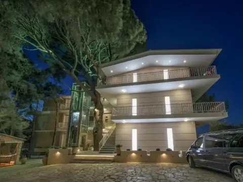 Koukounaria Hotel & Suites - Photo 1