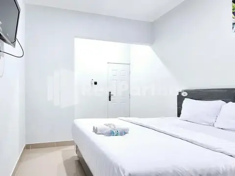 Aster Triplets Guest House JCM Mitra RedDoorz - Photo 2