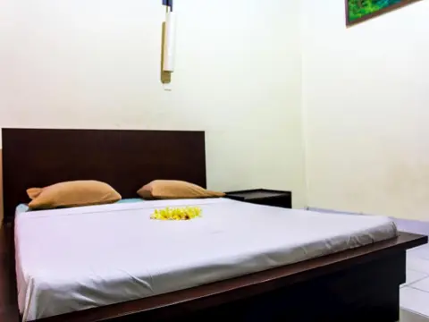 Budhi Beach Inn - Photo 1