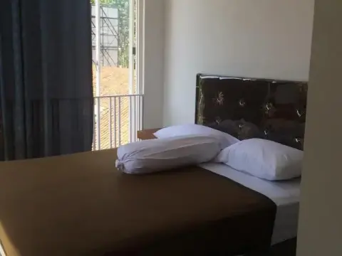 Kuta Three Hotel - Photo 1