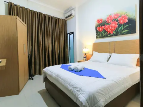 Labuana Homestay and Cafe Garden Makassar - Photo 2