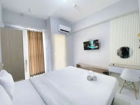 Minimalistic and Cozy Studio Amartha View Apartment - Photo 4