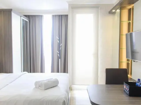 Nice And Fancy Studio Room At Menteng Park Apartment - Photo 1