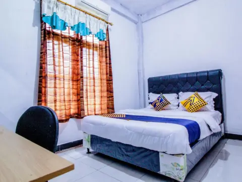 OYO 2226 Nurmega Jaya - Photo 2