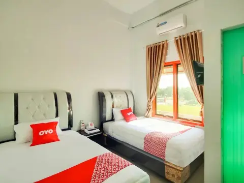 OYO 3844 Shinta Guesthouse - Photo 2