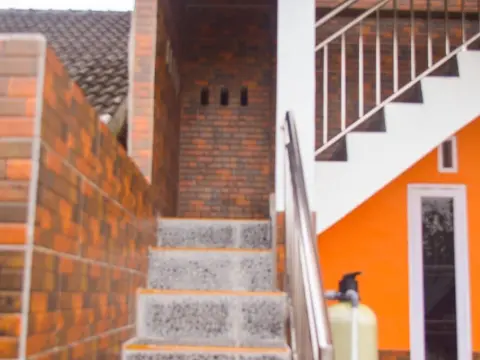 SPOT ON 91463 Obby Guest House - Photo 1