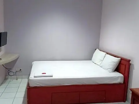 Super OYO 91104 Griya Mitra Residence - Photo 4