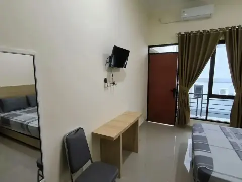 Tentrem Guesthouse Baru - Photo 4