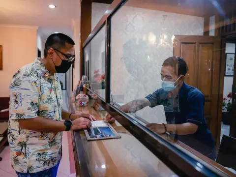 The Priangan Hotel I Yos Sudarso - Photo 4