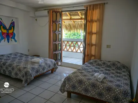 Nomad Beach House - Hostel - Photo 4