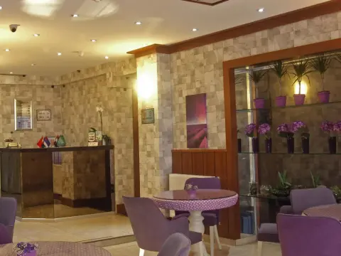 East Suite Hotel - Photo 2