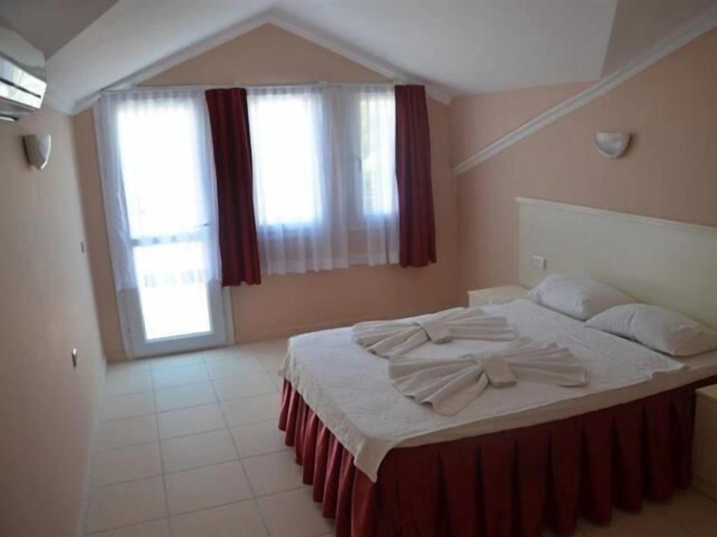 Green Valley Apartments - Photo 2